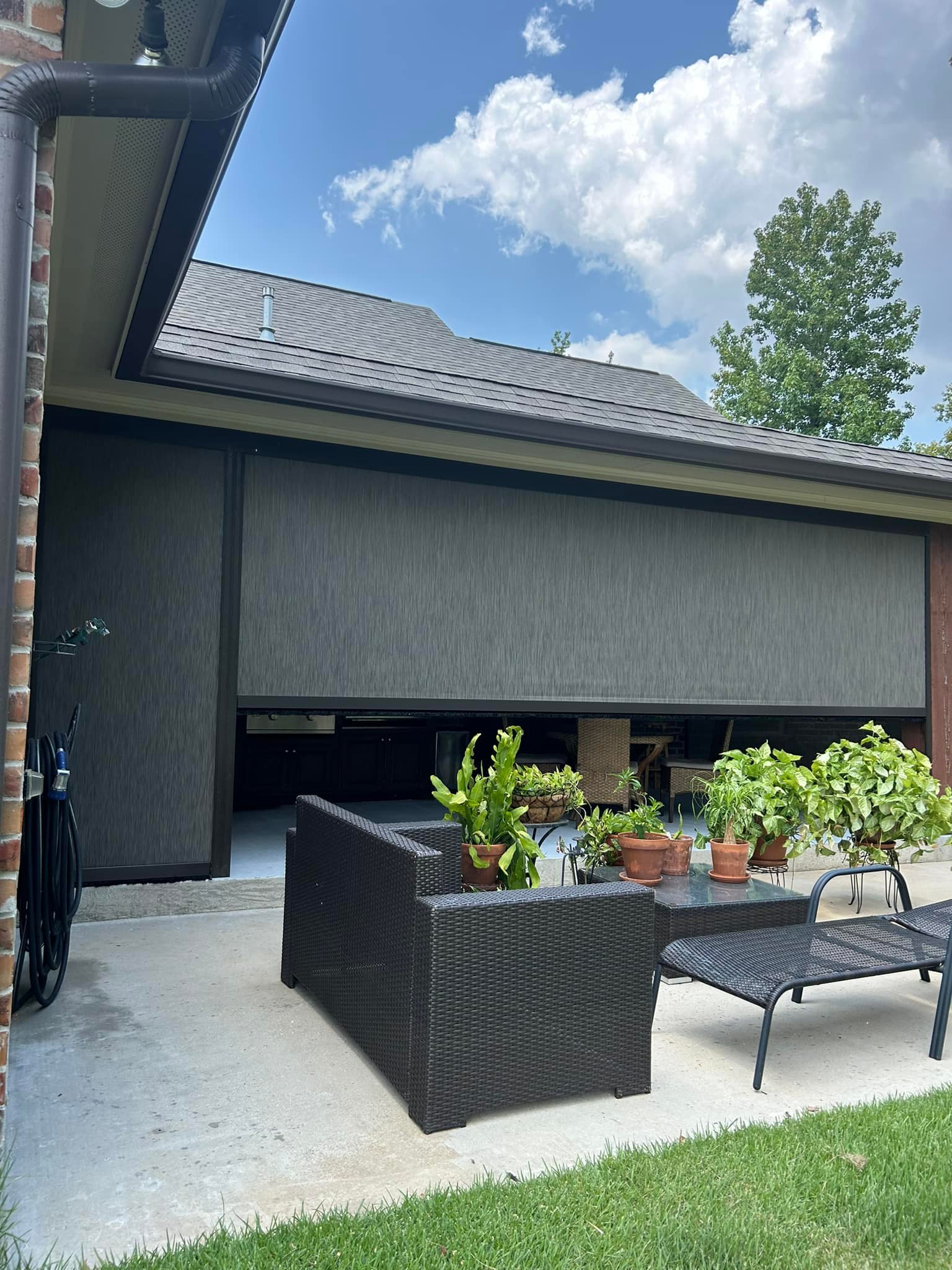 Patio motion screens installed on a modern outdoor seating area in Lafayette, LA