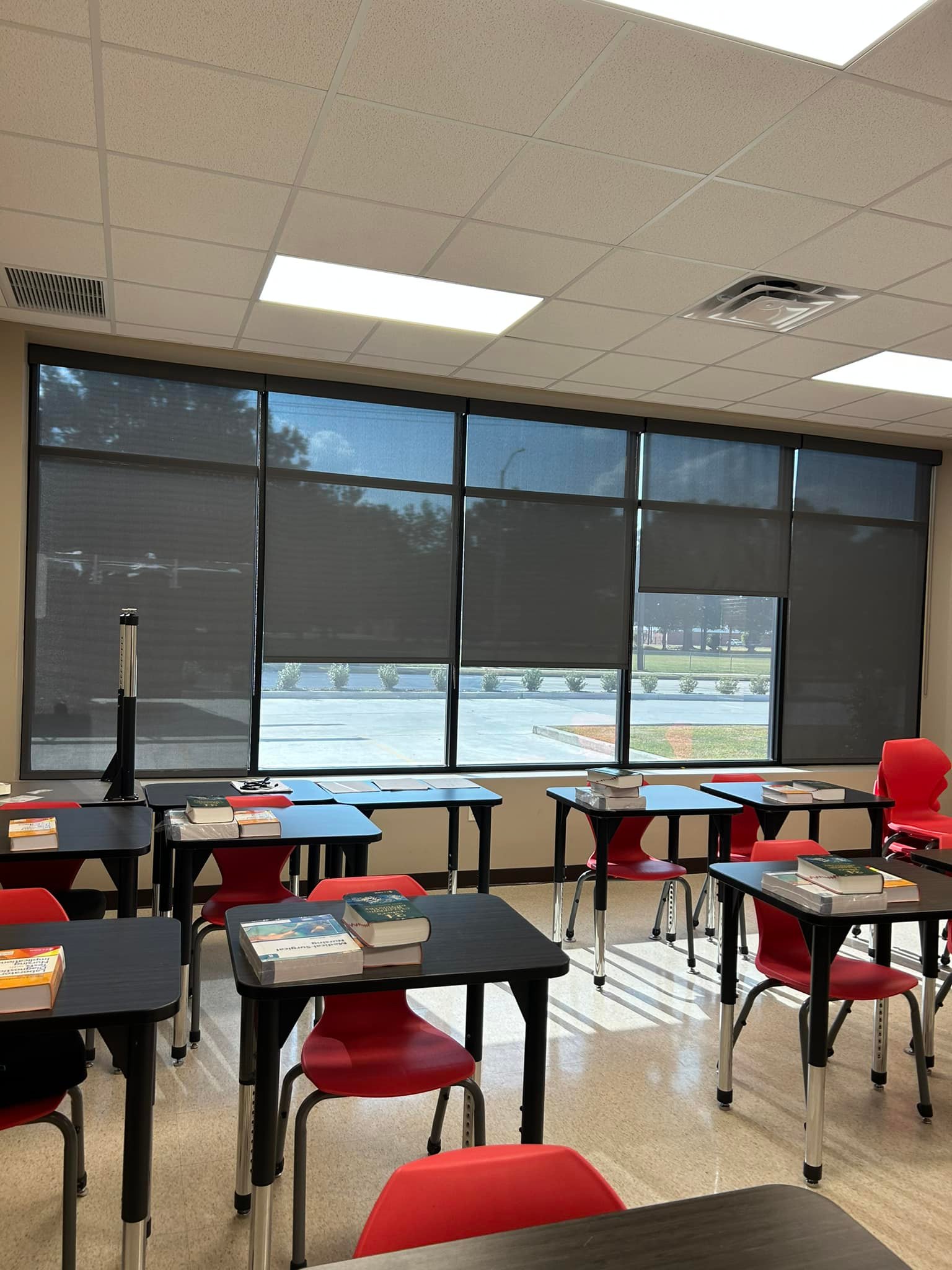 Commercial motion screens installed in an office environment for light control and visibility in Lafayette, LA